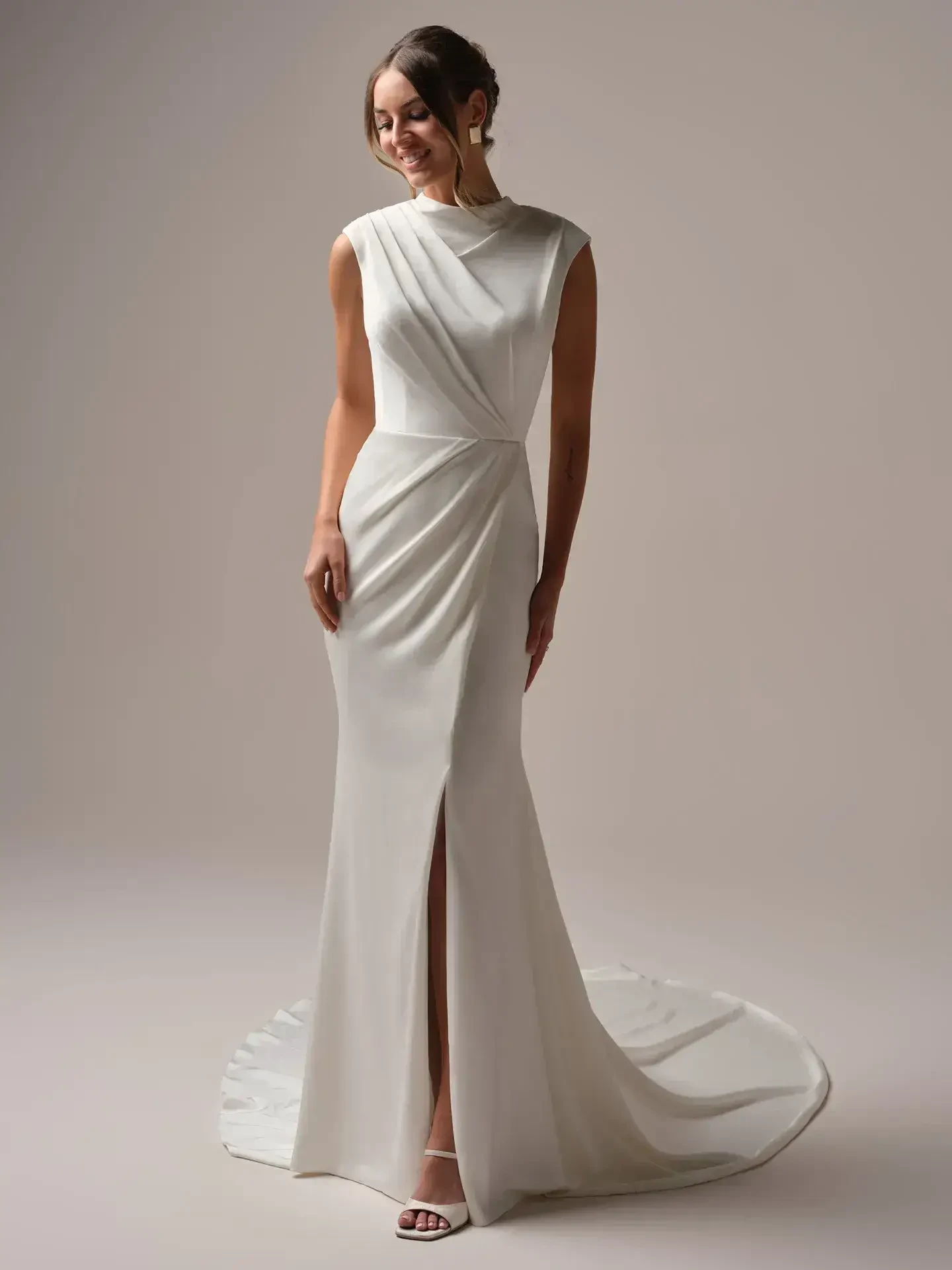 Model wearing a Rebecca Ingram gown